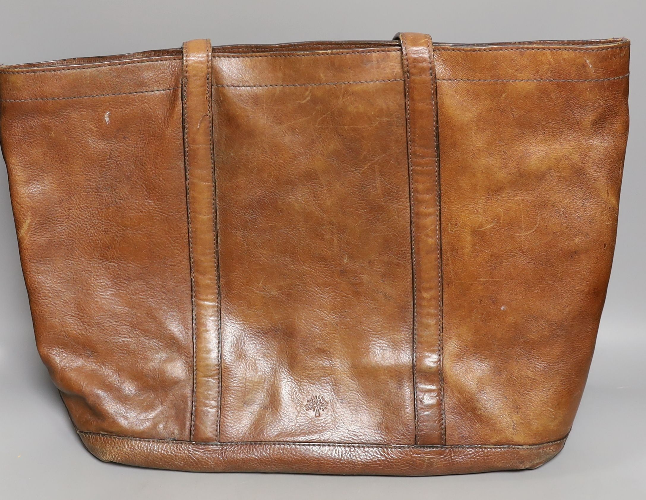 A vintage, Mulberry brown leather ‘shopper’, bag, with shoulder straps, 35 cms high x 52 cms wide.